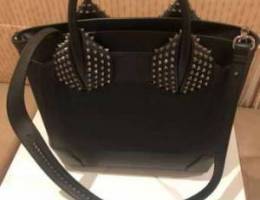 Authentic Christian Louboutin handbags for...