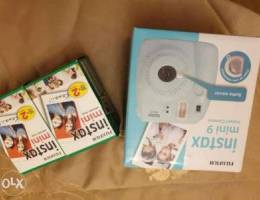 Brand new Instax mini 9 (sealed) with 2 pa...