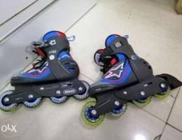 Roces 4 wheels skating shoes.. Adjustable ...