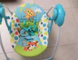 Battery operated automatic swing