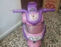 Adorable kids motor bike