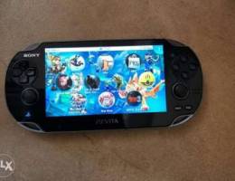 Ps vita with memory card and charging cabl...
