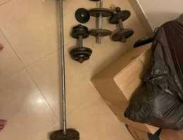 100kgs of weights + bar + 3 dumbbell bars ...