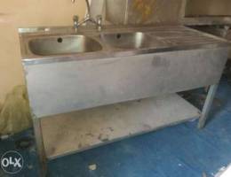 Steel sink with coverd tables