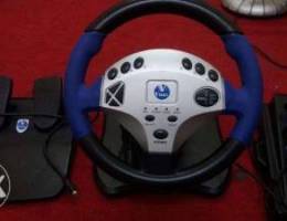 Gaming steering wheel with pedals and gear...