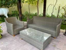 two sets of outdoor furniture with gazebos