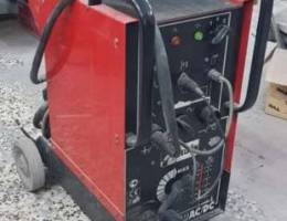 Welding machine with cylinder