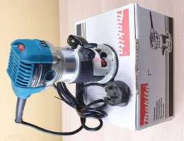 Makita router used 3 times only.