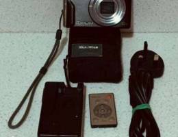 Casio Exilim EX-H10 digital camera with ac...