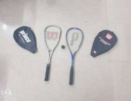 Two squash racquets