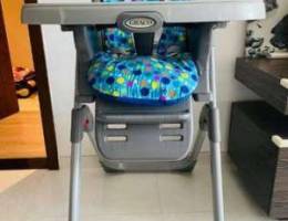 Graco Heavy duty High Chair, Converts to D...