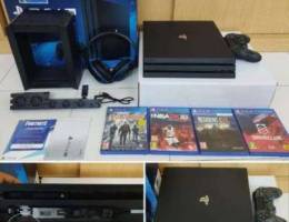 Ps4 Pro 4k 1 TB Mint Condition with lots o...