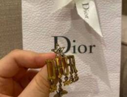 Dior brooch with Authentic dior bag and ri...