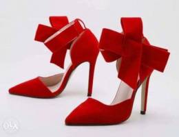 Red Stiletto heels with bow ankle strap