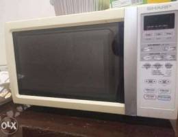 Microwave oven and cooking range