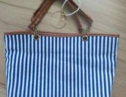 Bag with bracelet