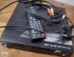 Zen DVD player with cables and remote.