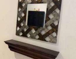 Mirror with shelve