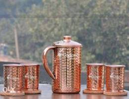 pure Hammered Copper with matching Glasses...