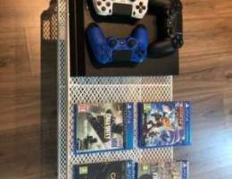 PS4 1To great condition + games + 3 contro...