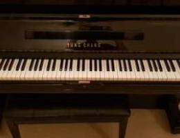 Upright acoustic piano