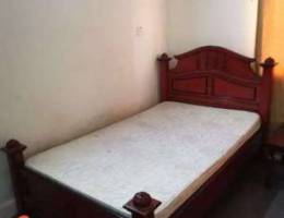 Double bed with mattress and side table ur...