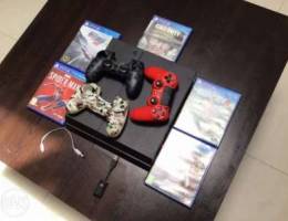 PS4 with 5 games 1 controller and 2 contro...