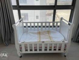 Baby cot for sale .