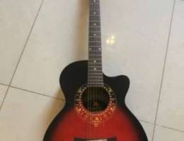 38â€ acoustic guitar red color with black s...