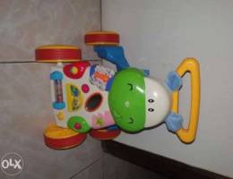 Baby walker barely used (with built-in toy...