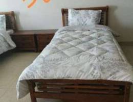 Single beds, dresser and 2 nightstands