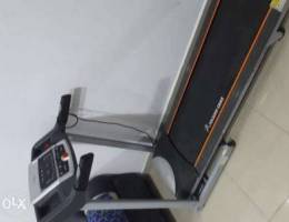 Treadmill with auto incline