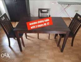 Wooden dining table with 3 chairs for sale...