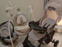 Set of matched baby swing crib, stroller a...