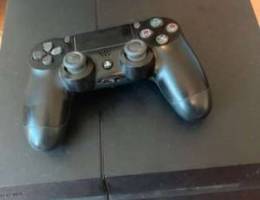 playstation 4 with controller and uncharte...