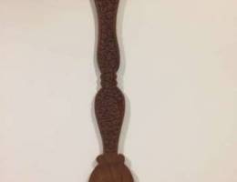 Wooden carved spoon hanging