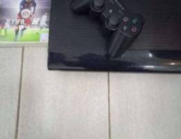 PS3 with FIFA and playing tab