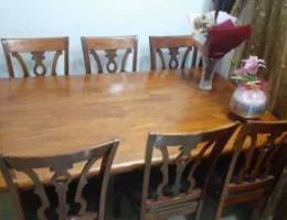 Clean dining table with 6 chairs